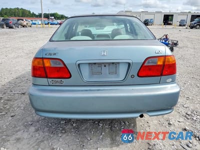 Zdjęcie 6 z 12 samochodu: 1999 HONDA CIVIC LX VIN:1HGEJ6678XL020579 - miniatura