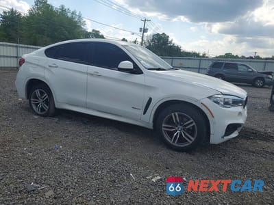 Czwarte zdjęcie samochodu z boku: 2018 BMW X6 XDRIVE35I VIN:5UXKU2C58J0X48785 - miniatura