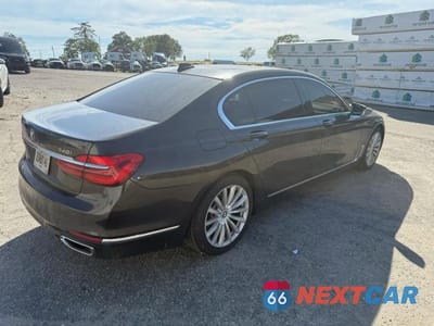 Czwarte zdjęcie samochodu z boku: 2016 BMW 740 I VIN:WBA7E2C52GG503997 - miniatura