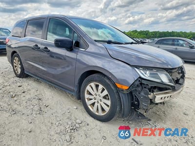 Czwarte zdjęcie samochodu z boku: 2019 HONDA ODYSSEY LX VIN:5FNRL6H27KB023559 - miniatura
