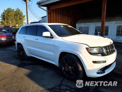 Czwarte zdjęcie samochodu z boku: 2015 JEEP GRAND CHEROKEE SRT-8 VIN:1C4RJFDJXFC822452 - miniatura