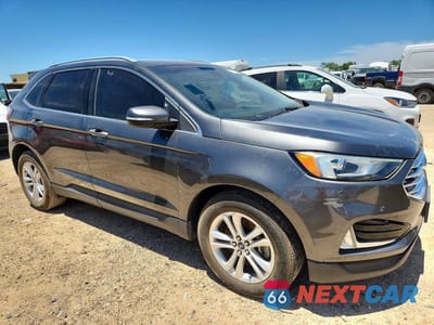 Czwarte zdjęcie samochodu z boku: 2020 FORD EDGE SEL VIN:2FMPK4J98LBA28575 - miniatura
