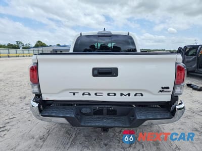 Zdjęcie 6 z 12 samochodu: 2021 TOYOTA TACOMA TRD OFF-ROAD VIN:3TMCZ5AN6MM451530 - miniatura