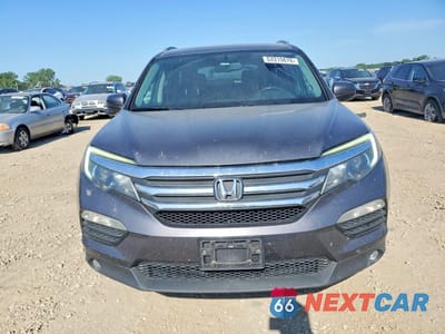 Piąte zdjęcie samochodu w środku: 2017 HONDA PILOT EXL VIN:5FNYF6H52HB098188 - miniatura
