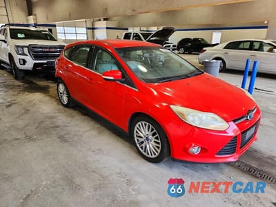 Czwarte zdjęcie samochodu z boku: 2012 FORD FOCUS SEL VIN:1FAHP3M20CL265263 - miniatura