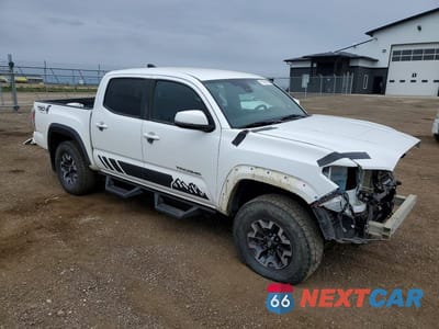 Czwarte zdjęcie samochodu z boku: 2020 TOYOTA TACOMA SR V6 VIN:5TFCZ5AN1LX216171 - miniatura