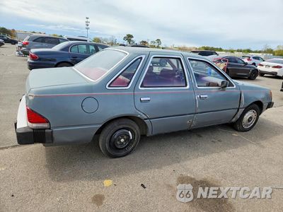 Trzecie zdjęcie samochodu z tyłu: 1984 FORD TEMPO GL VIN:2FABP22RXEB201668 - miniatura