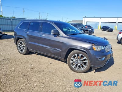 Czwarte zdjęcie samochodu z boku: 2018 JEEP GRAND CHEROKEE OVERLAND VIN:1C4RJFCG4JC135725 - miniatura