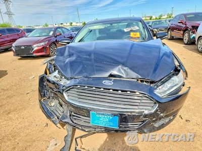 Piąte zdjęcie samochodu w środku: 2016 FORD FUSION SE PHEV VIN:3FA6P0PUXGR216520 - miniatura