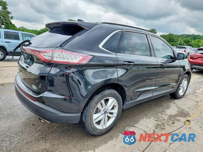 Trzecie zdjęcie samochodu z tyłu: 2015 FORD EDGE SEL VIN:2FMTK4J91FBB68583 - miniatura