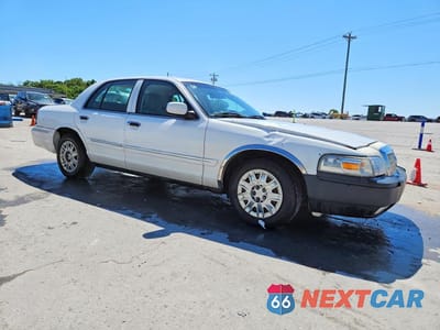 Czwarte zdjęcie samochodu z boku: 2007 MERCURY GRAND MARQUIS GS VIN:2MEFM74V97X638822 - miniatura