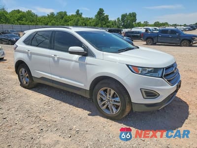 Czwarte zdjęcie samochodu z boku: 2015 FORD EDGE SEL VIN:2FMTK4J98FBB19980 - miniatura