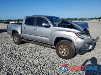 Czwarte zdjęcie samochodu z boku: 2017 TOYOTA TACOMA SR5 V6 VIN:5TFAZ5CN3HX035407 - miniatura