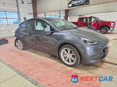 Czwarte zdjęcie samochodu z boku: 2023 TESLA MODEL Y VIN:7SAYGDEE9PF883248 - miniatura