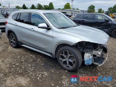 Czwarte zdjęcie samochodu z boku: 2017 BMW X1 SDRIVE28I VIN:WBXHU7C39H5H37787 - miniatura