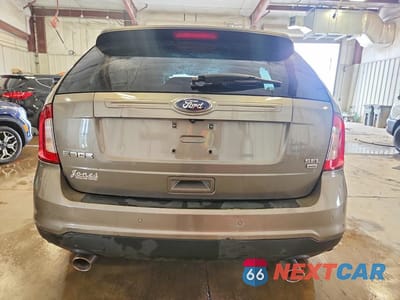Zdjęcie 6 z 13 samochodu: 2014 FORD EDGE SEL VIN:2FMDK4JCXEBA91792 - miniatura