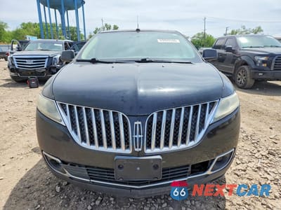 Piąte zdjęcie samochodu w środku: 2011 LINCOLN MKX VIN:2LMDJ8JKXBBJ11640 - miniatura