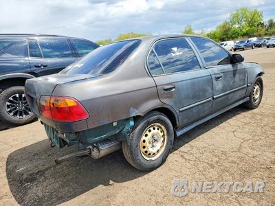 Piąte zdjęcie samochodu w środku: 1999 HONDA CIVIC LX VIN:2HGEJ6670XH560411 - miniatura