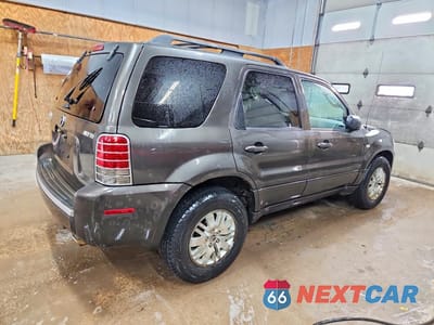 Trzecie zdjęcie samochodu z tyłu: 2006 MERCURY MARINER VIN:4M2YU57156DJ01694 - miniatura