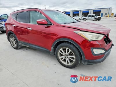 Czwarte zdjęcie samochodu z boku: 2014 HYUNDAI SANTA FE SPORT 2.0T VIN:5XYZU3LA2EG129909 - miniatura