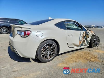 Trzecie zdjęcie samochodu z tyłu: 2016 TOYOTA SCION VIN:JF1ZNAA12G8703185 - miniatura