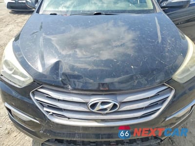 Zdjęcie 12 z 13 samochodu: 2017 HYUNDAI SANTA FE SPORT 2.4L VIN:5XYZU3LBXHG481682 - miniatura