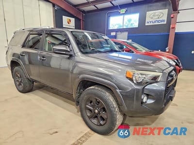 Czwarte zdjęcie samochodu z boku: 2015 TOYOTA 4RUNNER SR5 VIN:JTEBU5JRXF5273736 - miniatura