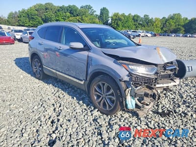 Czwarte zdjęcie samochodu z boku: 2020 HONDA CR-V TOURING VIN:2HKRW1H98LH415721 - miniatura