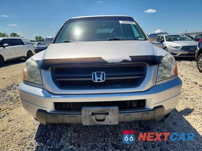 Piąte zdjęcie samochodu w środku: 2005 HONDA PILOT EX VIN:2HKYF18415H535511 - miniatura
