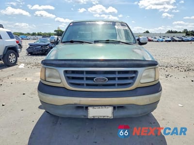 Piąte zdjęcie samochodu w środku: 2001 FORD F150 SUPERCREW VIN:1FTRW07L71KD60894 - miniatura