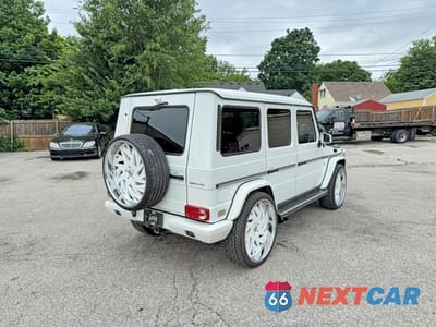 Czwarte zdjęcie samochodu z boku: 2014 MERCEDES-BENZ G 63 AMG VIN:WDCYC7DFXEX214231 - miniatura