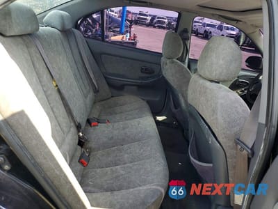 Zdjęcie 10 z 12 samochodu: 2003 HYUNDAI ELANTRA GLS VIN:KMHDN45D83U532448 - miniatura