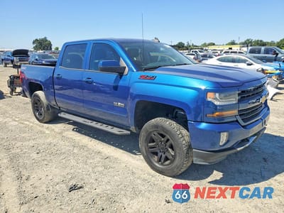 Czwarte zdjęcie samochodu z boku: 2016 CHEVROLET SILVERADO K1500 LT VIN:3GCUKREC2GG140799 - miniatura