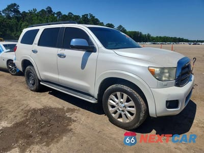 Czwarte zdjęcie samochodu z boku: 2015 TOYOTA SEQUOIA PLATINUM VIN:5TDYY5G18FS056202 - miniatura