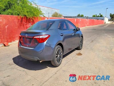 Czwarte zdjęcie samochodu z boku: 2015 TOYOTA COROLLA S PLUS VIN:5YFBURHE6FP316535 - miniatura