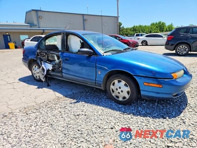 Czwarte zdjęcie samochodu z boku: 2002 SATURN SL1 VIN:1G8ZH54872Z259400 - miniatura