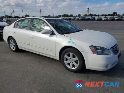 Czwarte zdjęcie samochodu z boku: 2002 NISSAN ALTIMA 2.5 VIN:1N4AL11D32C147133 - miniatura