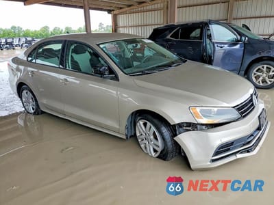 Czwarte zdjęcie samochodu z boku: 2015 VOLKSWAGEN JETTA BASE VIN:3VW2K7AJ7FM213162 - miniatura