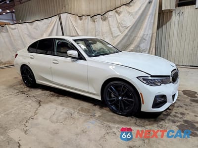 Czwarte zdjęcie samochodu z boku: 2019 BMW 330XI VIN:WBA5R7C52KAJ80636 - miniatura