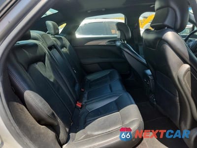 Zdjęcie 10 z 12 samochodu: 2017 LINCOLN MKZ RESERVE VIN:3LN6L5FC5HR613982 - miniatura