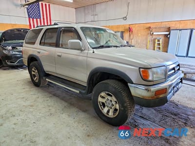 Czwarte zdjęcie samochodu z boku: 1996 TOYOTA 4RUNNER SR5 VIN:JT3HN86R0T0002817 - miniatura