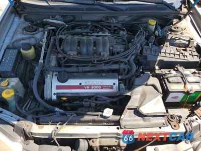 Zdjęcie 11 z 12 samochodu: 2000 NISSAN MAXIMA GXE VIN:JN1CA31D6YT709946 - miniatura