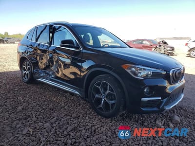 Czwarte zdjęcie samochodu z boku: 2016 BMW X1 XDRIVE28I VIN:WBXHT3C39GP882128 - miniatura