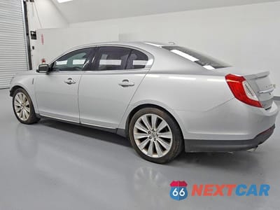 Drugie zdjęcie samochodu z przodu: 2015 LINCOLN MKS VIN:1LNHL9FT1FG607990 - miniatura