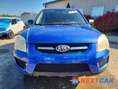 Piąte zdjęcie samochodu w środku: 2009 KIA SPORTAGE LX VIN:KNDJE723097590727 - miniatura