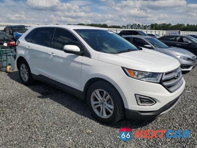Czwarte zdjęcie samochodu z boku: 2017 FORD EDGE SEL VIN:2FMPK4J96HBB35888 - miniatura