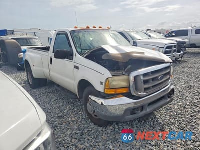 Czwarte zdjęcie samochodu z boku: 1999 FORD F350 SUPER DUTY VIN:1FTWF32F6XEB13086 - miniatura