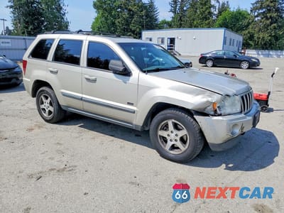 Czwarte zdjęcie samochodu z boku: 2007 JEEP GRAND CHEROKEE LAREDO VIN:1J8HR48P67C620645 - miniatura