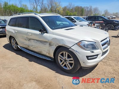 Czwarte zdjęcie samochodu z boku: 2013 MERCEDES-BENZ GL 450 4MATIC VIN:4JGDF7CE2DA262923 - miniatura