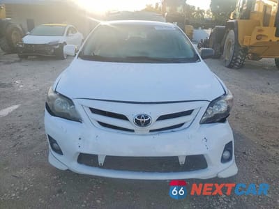 Piąte zdjęcie samochodu w środku: 2011 TOYOTA COROLLA S VIN:2T1BU4EE0BC565902 - miniatura